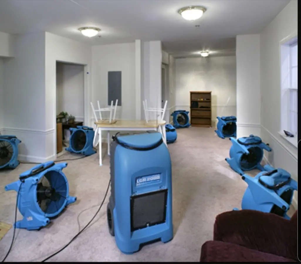 Air movers and dehumidifier setup for Water Damage Restoration in Inverness